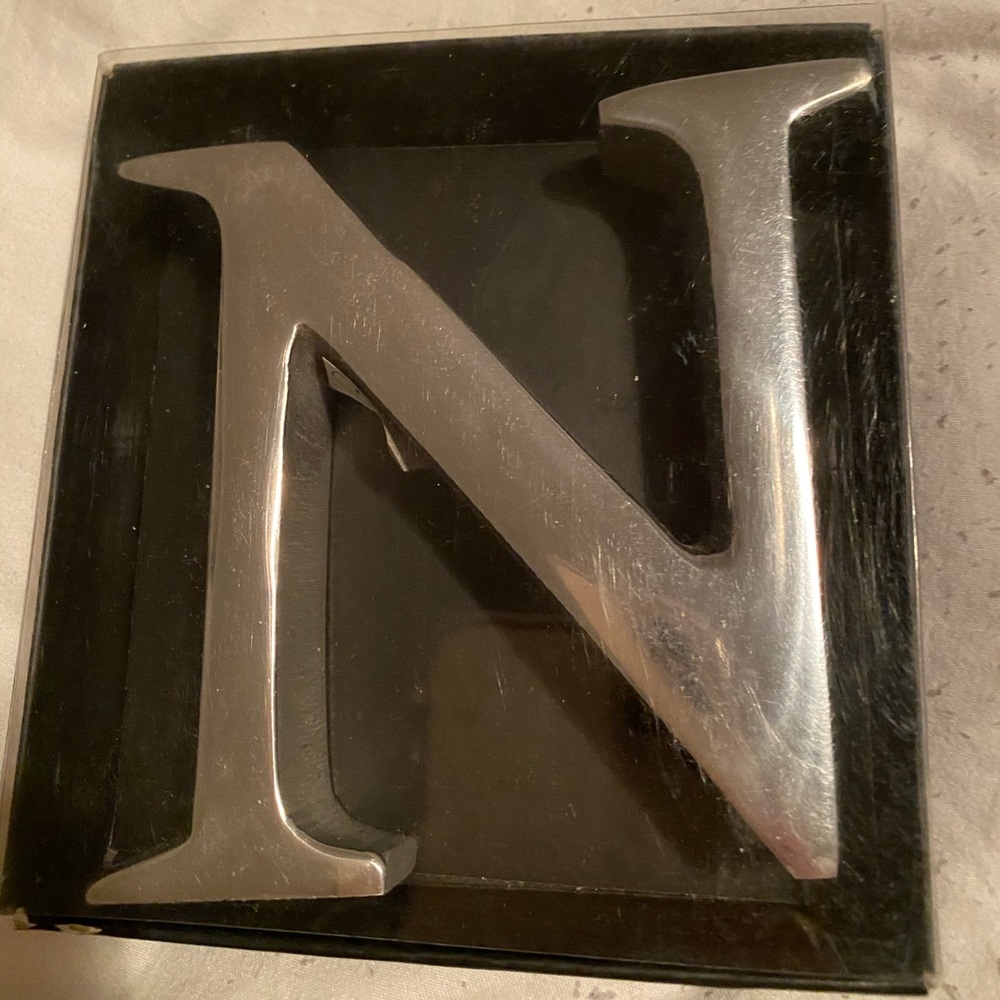 Decorative N figure. New in box
